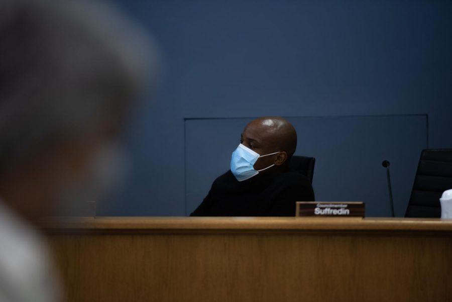 Ald. Bobby Burns (5th) sits behind the council dais.