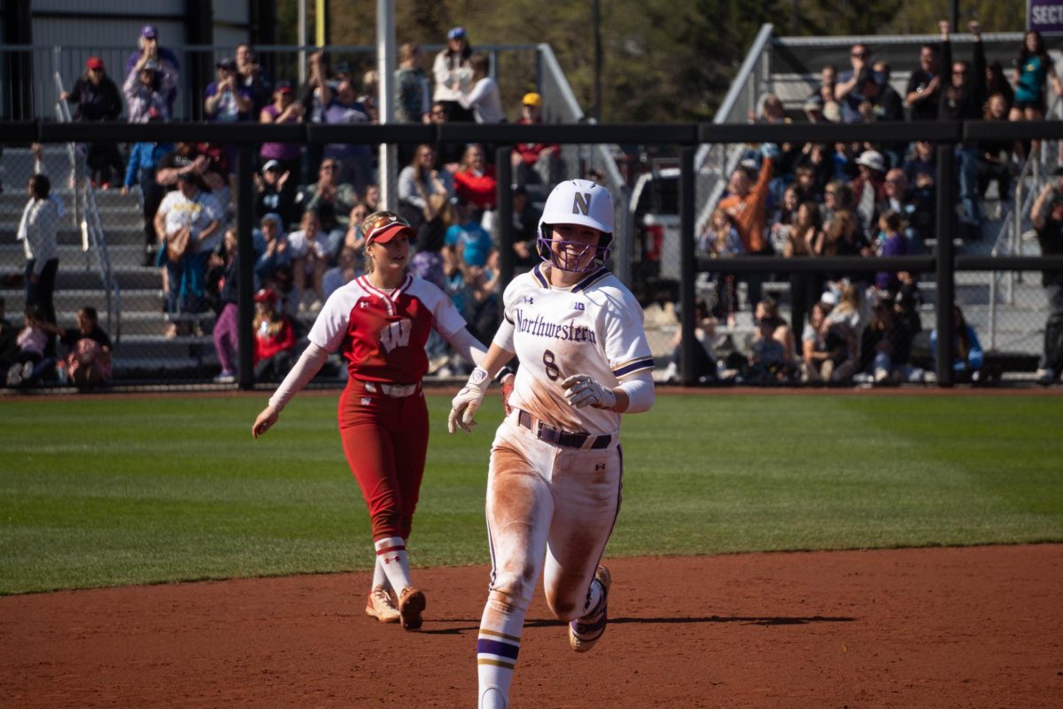 A player smiles while running the bases.